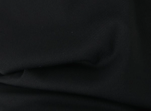 Macro di tessuto a maglia a coste nere di alta qualità con dettagli della trama verticale