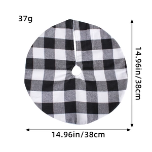 Flat lay of small 38cm black and white checkered Christmas tree skirt weighing 37g