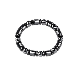 Detail of hematite yoga beads bracelet with polished black metallic cylinder charms