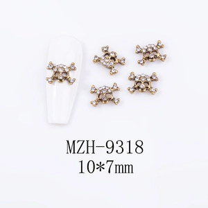Detail of MZH-9318 bronze skull nail art studs with sparkling white rhinestones 5pcs