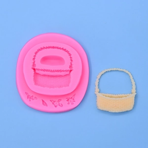 Pink silicone flower basket mold and cream-colored woven basket cake topper detail