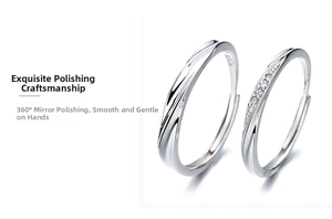 Macro detail of S925 sterling silver couple rings showing inner stamps and polished finish