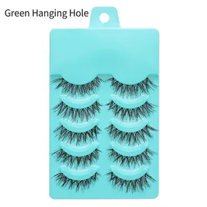 Detailed view of 5 pairs of natural manga false eyelashes with a green hanging hole