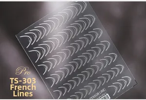 Close-up of TS-303 Pro 5D white French line nail art stickers on dark textured surface