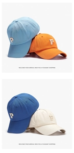 Close-up of four colorful cotton baseball caps with 3D embroidered P letter patches