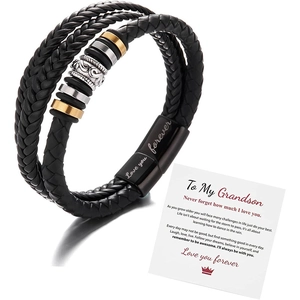 Close-up of multilayer braided leather bracelet with gift card for grandson
