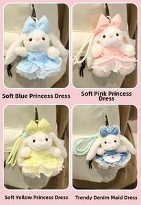 Detailed view of plush rabbit keychain set with lace dresses and colorful bow ties