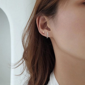 Minimalist S925 silver cactus stud earring and zircon C-shaped hoop on model ear