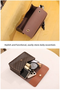 Internal storage view of vintage monogram small bag with silk scarf and daily essentials