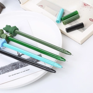 Set of 5 colorful 3D cartoon animal silicone head gel pens on a white ceramic tray
