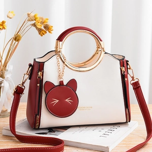 Women Handbag PU Leather Color Block Shoulder Crossbody Bag With Round Metal Handle And Cute Cat Charm Chic Fashion