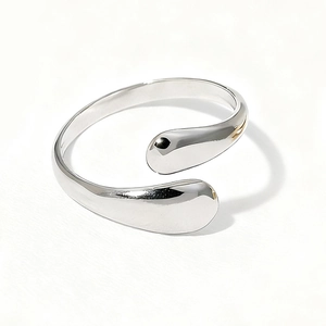 Polished silver adjustable open ring with a minimalist organic teardrop design