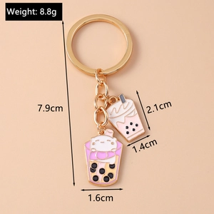Detail view of cartoon milk tea cat keychain showing 7.9cm length and 8.8g weight specs