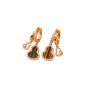 Elegant gold earrings with tiger eye stone and zircons in a gourd shape on white background