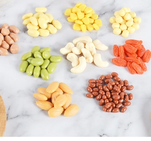 Detailed flat lay of highly realistic PVC grains, nuts, and legume models for DIY decor