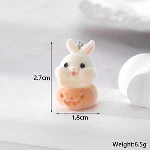 Flocked white bunny in orange pumpkin Halloween pendant with size and weight info