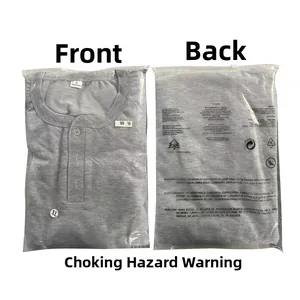 Detail view of a gray long-sleeve Henley shirt size XL in transparent packaging