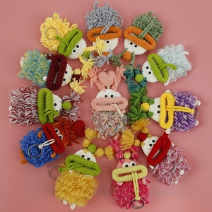 Handmade crochet monster key covers in vibrant colors with premium metal keychains
