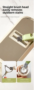 Dual-sided kitchen cleaning brush for cutlery with green handle and stiff black bristles