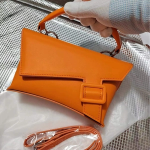 Vibrant orange geometric crossbody waist bag with top handle and adjustable strap