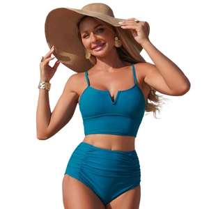 Two-piece dark blue bikini set with V-neck top and high-waisted ruched bottoms