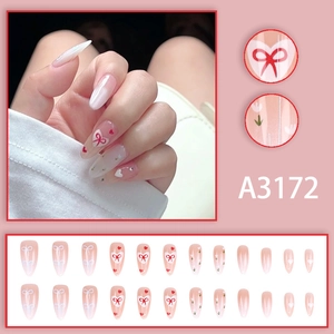 French style almond press-on nails with red bow and heart patterns in pink gradient