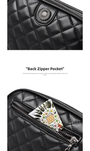 Close-up of black quilted leather crossbody bag featuring back zipper pocket and daisy charm