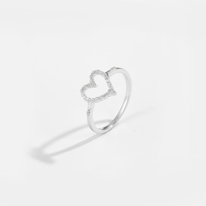 Detailed macro view of an S925 silver ring featuring a hollow heart set with cubic zirconia