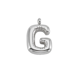 Macro detail of puffy bubble letter G pendant in polished silver stainless steel finish
