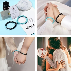 Detail of natural stone magnetic couple bracelets with white turquoise beads on gift card