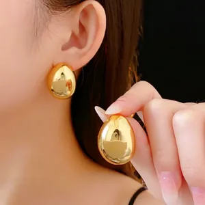Polished gold-plated teardrop earrings with luxury mirror finish for minimalist style