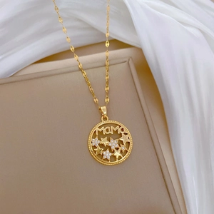 Luxurious gold star pendant necklace with MAMA engraving and sparkling crystals for women