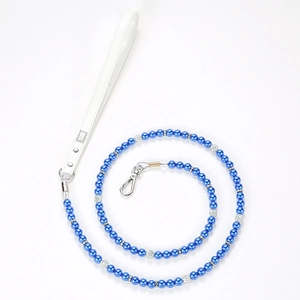 Blue pearl pet leash with white leather handle and silver metal clasp detail on white background