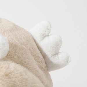 Cute bird-themed plush earflap hat for women featuring warm wings and soft faux fur detail