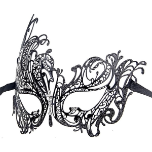 Detail of black laser-cut masquerade mask with glitter swan pattern and sparkling rhinestones
