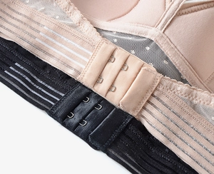 Close-up of U-back bra showing double row hooks and breathable striped mesh side wings