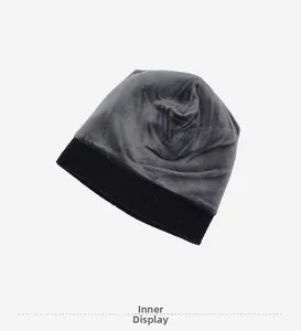 Detailed view of the soft velvet fleece lining inside the black knitted beanie