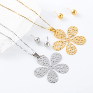 Elegant hollow floral necklace and stud earrings set in polished gold and silver finishes