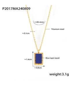 Macro shot of 18K gold plated titanium necklace with blue lapis lazuli pendant