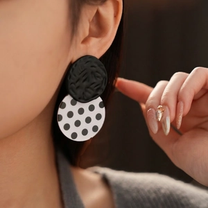 Classic black and white polka dot geometric acrylic earrings with round textured studs
