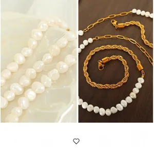 Detailed close-up of mixed pearl and gold twist chain necklace set on shell and wood