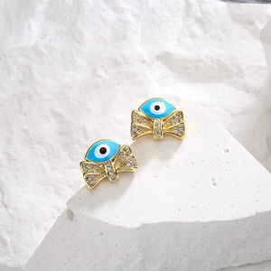 18K gold plated bow evil eye earrings with blue enamel and sparkling cubic zirconia