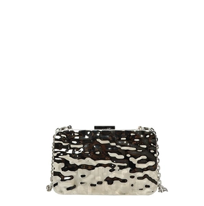 Macro view of silver evening bag with marble texture and wavy metallic 3D surface
