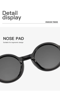 Close-up of ergonomic nose pads on vintage round frame sunglasses in black finish