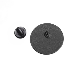 Macro shot of durable black metal pin back with secure rubber clutch fastener