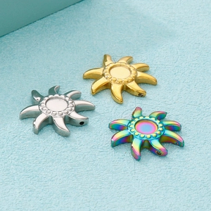 Polished stainless steel sun charm pendants in gold, silver and rainbow finishes