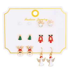 Detail showing 6 pairs of festive Christmas stud earrings on a branded display card