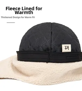 Detail of winter warm hat with quilted faux suede exterior and soft sherpa fleece lining