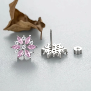 Silver snowflake earring studs with pink marquise zircon stones and screw back closure