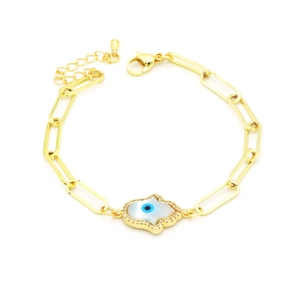 Detail of gold paperclip chain bracelet with Hamsa Hand and blue Evil Eye charm